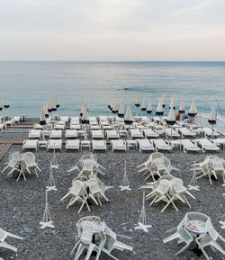 View of chairs on beach