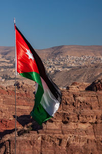 View of flag on rock