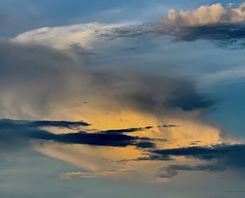 Low angle view of clouds in sky during sunset