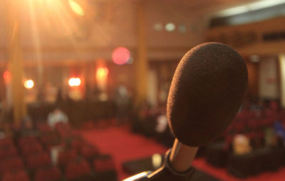Close-up of microphone in theater