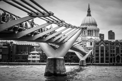 Gazebo in city against sky