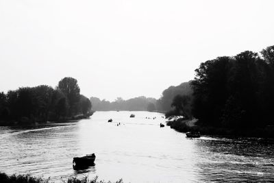 Scenic view of river against clear sky