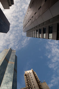 Low angle view of modern buildings against sky