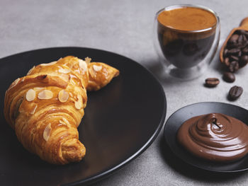 High angle view of coffee served on table