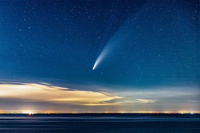 Scenic view of sea against sky at night