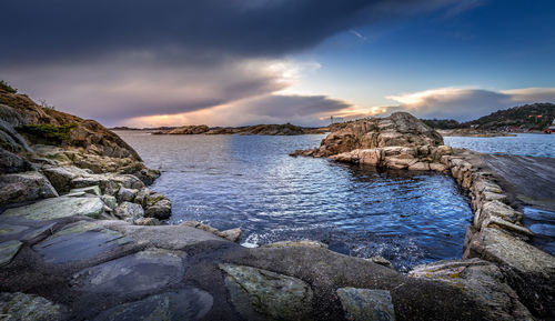 Scenic view of sea against sky during sunset