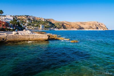 Scenic view of sea against clear sky