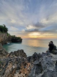 Scenic view of sea against sky during sunset