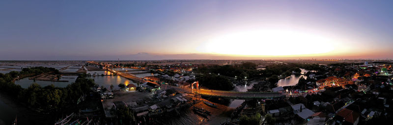 High angle view of townscape against sky during sunset