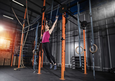 Woman exercising at gym