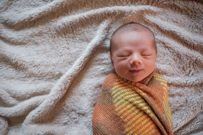 Close-up of cute baby boy sleeping