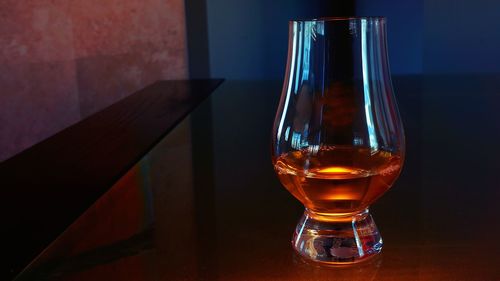 Close-up of scotch whiskey in glass on table