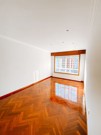 Low angle view of house on hardwood floor in building