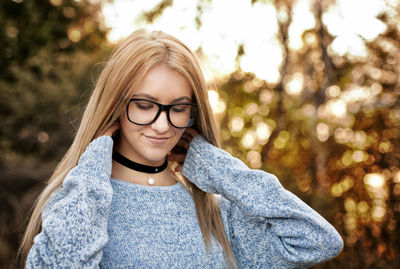 Portrait of young woman outdoors