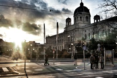 City street against cloudy sky