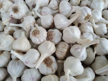 Full frame shot of onions for sale in market