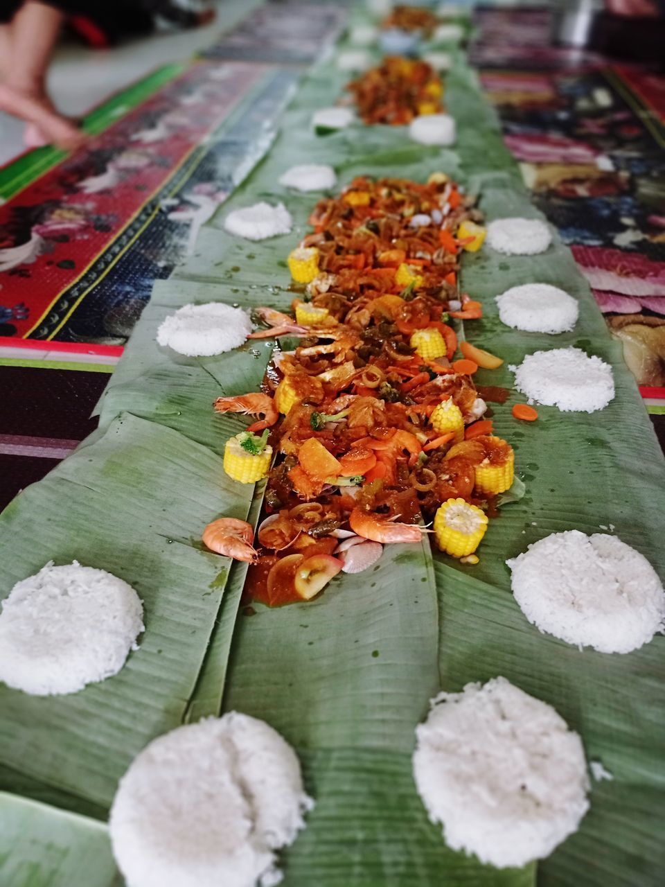 HIGH ANGLE VIEW OF FOOD ON LEAF AT HOME