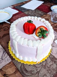 High angle view of strawberry cake on table