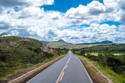 Empty road against sky