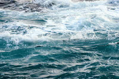 Stormy dark sea. deep blue water from top view. 