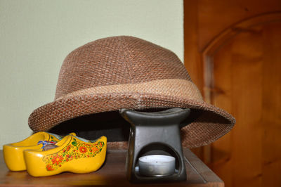 Travel arrangement with hat, souvenirs and the scented candles