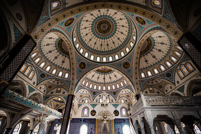 Low angle view of ornate ceiling