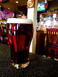 View of beer in glass on table