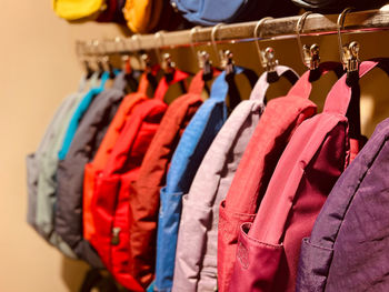 Close-up of clothes hanging on rack