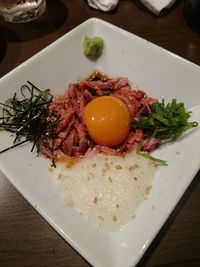 Close-up of food served on table