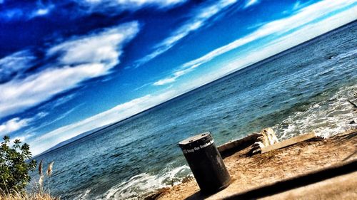 Scenic view of sea against cloudy sky
