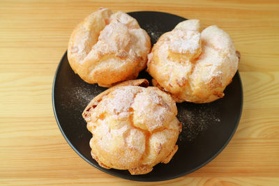 High angle view of bread in plate on table