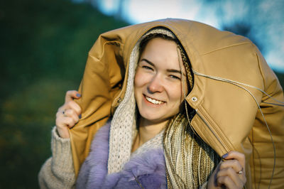 Portrait of young woman smiling