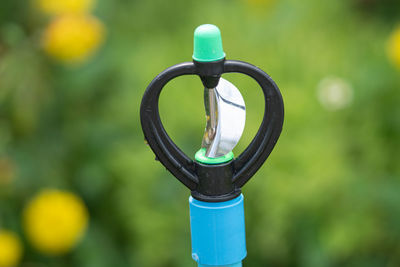 Close-up of metallic pole against blurred background