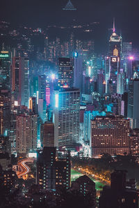 Illuminated buildings in city at night