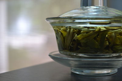 Close-up of tea in glassware on table