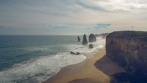 Scenic view of beach against sky