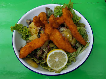 High angle view of fruits in plate on table