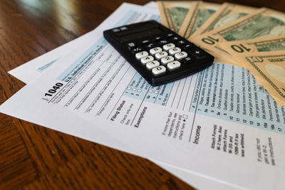 High angle view of paper on table