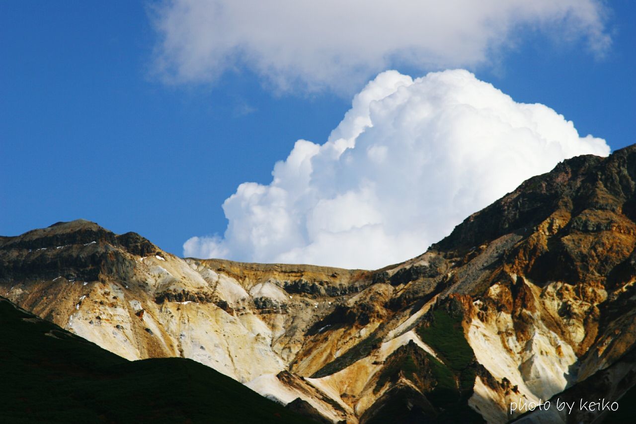 mountain, sky, cloud - sky, scenics, nature, low angle view, beauty in nature, physical geography, tranquility, day, outdoors, no people, landscape