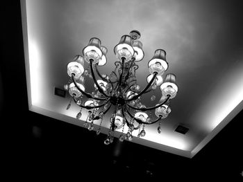 Low angle view of illuminated light bulb at home