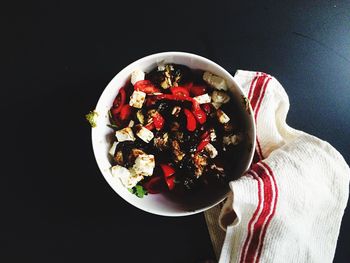 Close-up of fruits in bowl on table