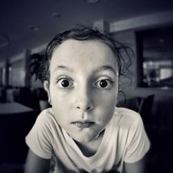 Close-up portrait of boy at home