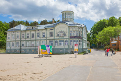 View of building against cloudy sky