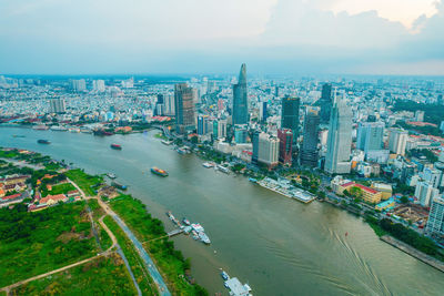 High angle view of river amidst buildings in city