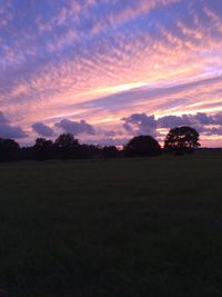 Scenic view of landscape at sunset