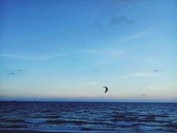 Scenic view of sea against sky at sunset