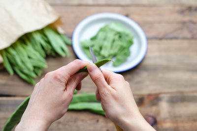 Cropped image of person holding rice