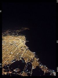 Illuminated cityscape at night