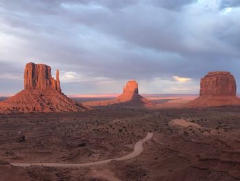 Rock formations in desert against sky