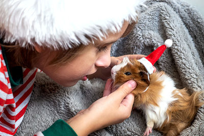 Close-up of girl with dog